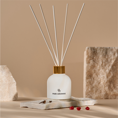 Luxury home fragrance diffuser with raspberry, plum, and patchouli for a vibrant, island-inspired scent experience
