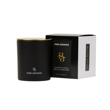 Eco-friendly Reggae Rhythm candle with notes of raspberry, whipped vanilla, and rosewater in minimal packaging