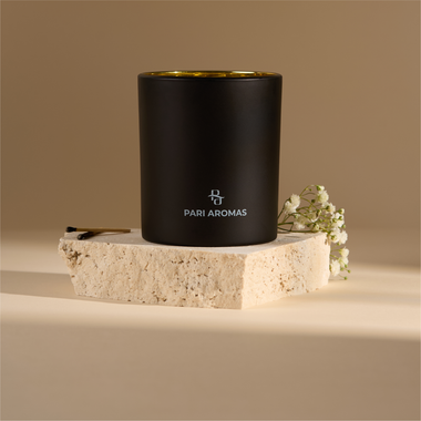 Eco-friendly coconut soy candle labeled Chamomile & Blue Amber