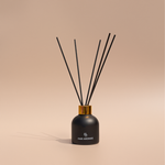 Natural reed diffuser with ginger root, pomelo, and cashmere musk in a phthalate-free, clean aroma formula