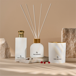 Hand-poured soy candle with fruity and spicy tropical scent set in a stone background