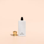 Eco-friendly home fragrance spray with plum, pepper, amber, and musk crafted with clean, non-toxic ingredients for island-inspired freshness
