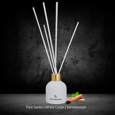 Pari Aromas Patchouli, Palo Santo & Sandalwood Reed Diffuser – A grounding blend of earthy patchouli, mystical palo santo, and smooth sandalwood for a calming and soothing atmosphere.