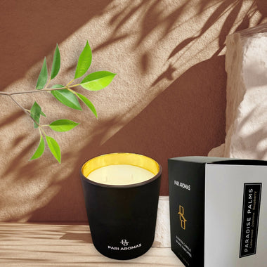Pari Aromas scented candle with cedarwood, vetiver, and raspberry, balancing earthy and fruity tones.