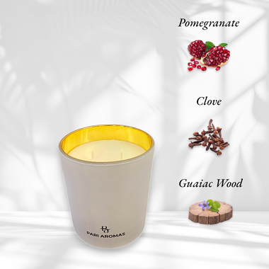 Pari Aromas scented candle with pomegranate, plum, and clove, a rich and fruity blend with a warm spice finish.