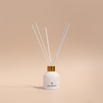 Eco-friendly reed diffuser with orange peel and Mysore sandalwood in a long-lasting, phthalate-free aroma blend
