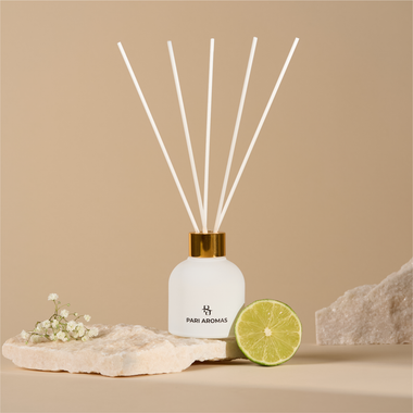 Vibrant home fragrance diffuser with zesty lime, peony, and pink pepper to energize your space with Caribbean vibes

